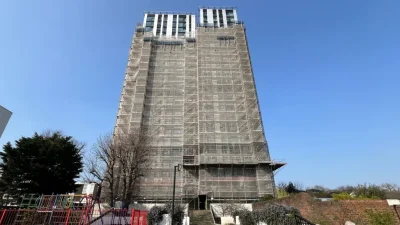 Apology over inside-out windows on tower blocks