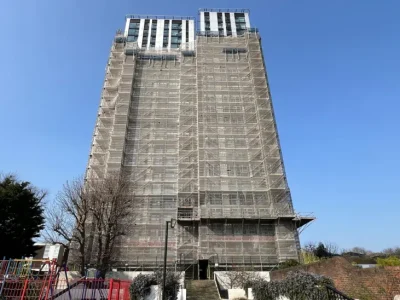 Apology over inside-out windows on tower blocks