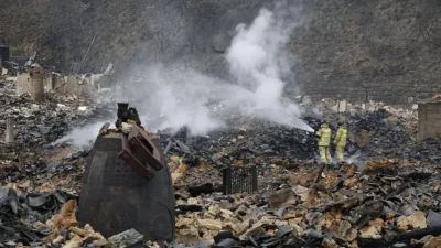 Man tending grave probed for starting South Korea fires