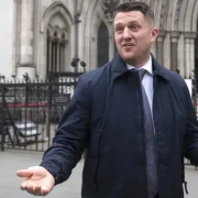 Tommy Robinson fined after failing to turn up at High Court finances hearing