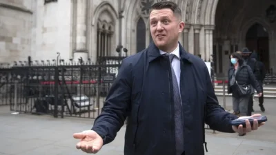 Tommy Robinson fined after failing to turn up at High Court finances hearing